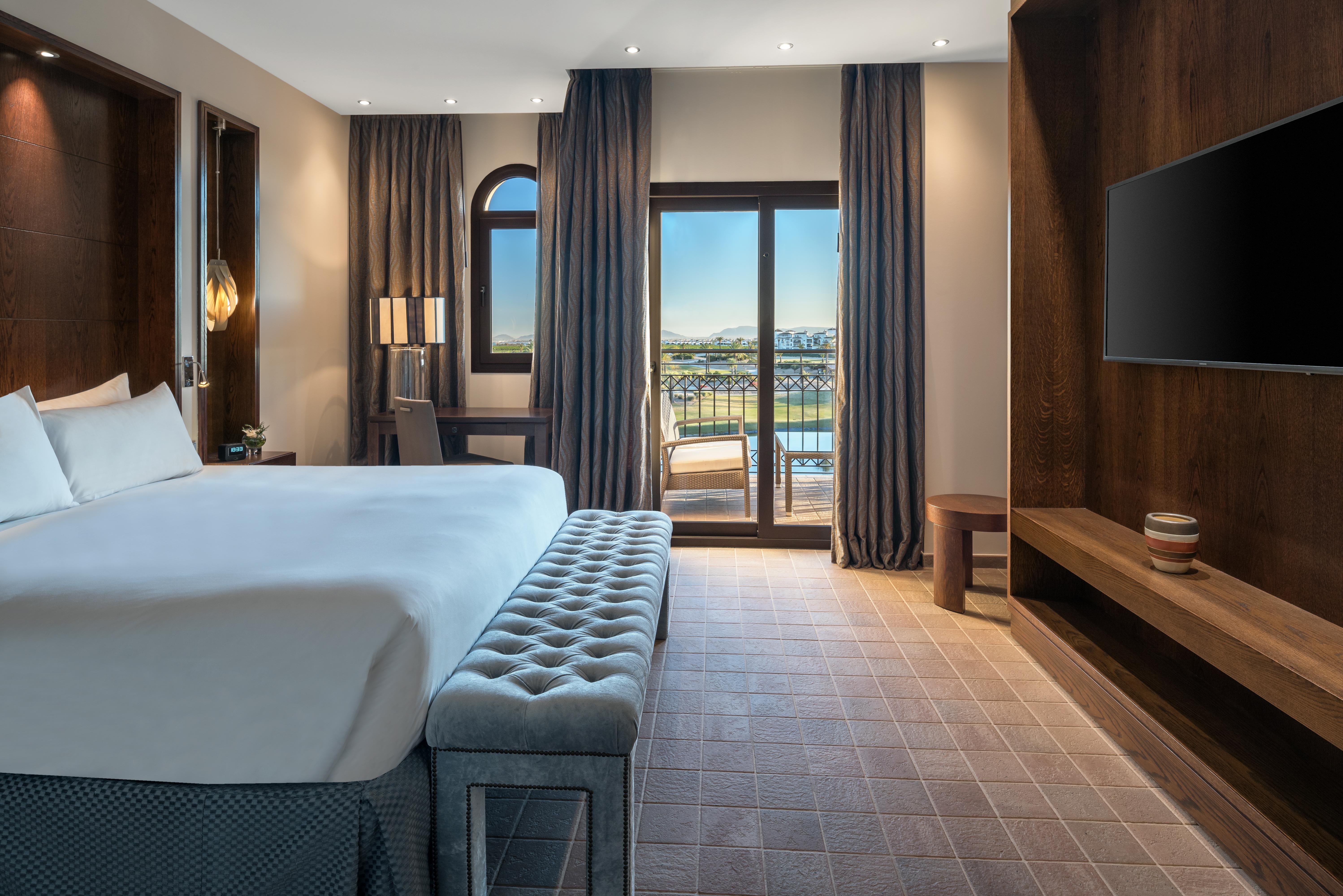 Doubletree By Hilton La Torre Golf Resort Roldán Zewnętrze zdjęcie A guest room at the hotel