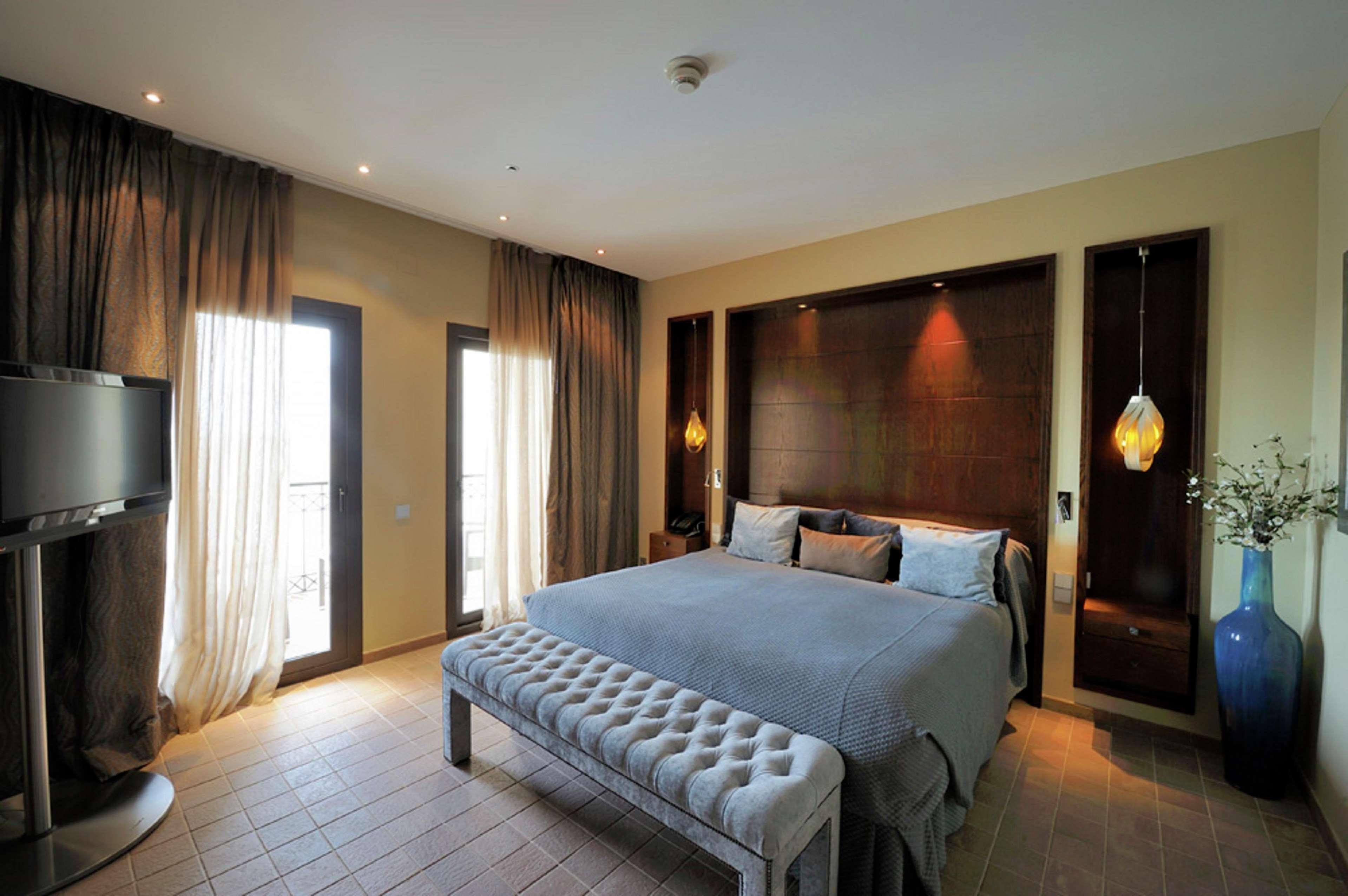 Doubletree By Hilton La Torre Golf Resort Roldán Zewnętrze zdjęcie A bedroom at the hotel